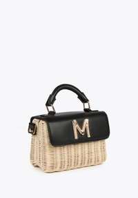 Woven straw handbag with a black leather flap and golden letter 'M' accent. Features a rounded top handle and metal hardware.