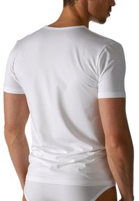T-shirt bianco a maniche corte realizzato in cotone liscio, con scollatura rotonda e design aderente, in tessuto bianco uniforme e cuciture minime.