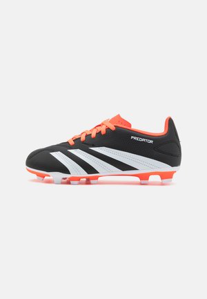 Black soccer cleat with vibrant orange accents and white stripes, synthetic material, low profile design, textured surface, and molded studs.