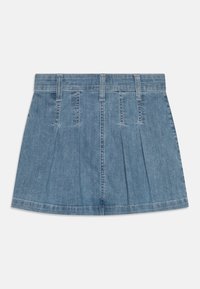 Denim skirt with a light blue wash, featuring pleats, five belt loops, and a straight hem. Smooth texture with contrasting stitching.