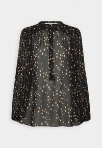 Blouse noire transparente avec taches irrégulières beige, manches longues bouffantes, patte de boutonnage à l'avant et col rond.