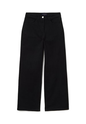 Zwarte jeans met wijde pijpen gemaakt van stevig katoen met een gladde textuur. Voorzien van vijf zakken en een knoopsluiting aan de voorkant.