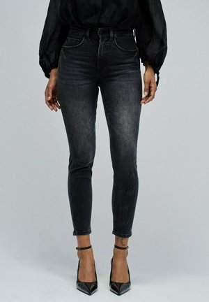 FAITH PUSH IN CROPPED - Vaqueros pitillo - schwarz