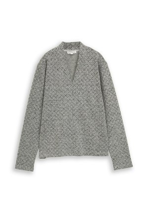 Pull en maille gris avec un col en V et des manches longues. Présente un motif texturé et une coupe décontractée, idéale pour les superpositions.