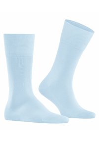 Calze di cotone blu chiaro con polsini a costine, texture liscia, forma standard delle calze e aree rinforzate sulla punta e sul tallone per una maggiore durata.