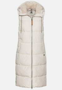 Puffervest i lys beige med lynlås, faux fur-forsynet hætte og to lommer. Kvadret tekstur med en glat overflade og kontrasterende læderdetaljer.