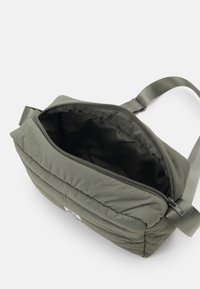 MSCH Copenhagen ICON CROSSOVER BAG KEY - Cross body bag - mulled basil