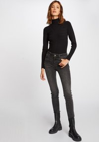 Morgan Trui - black