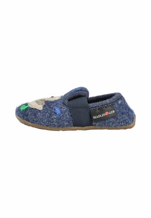 Pantofole di lana blu con cinturino elastico, suola in gomma e ricamo colorato di volto animale sulla parte superiore, con marchio Haflinger sul lato.