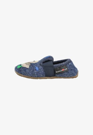 Pantofole di lana blu con cinturino elastico, suola in gomma e ricamo colorato di volto animale sulla parte superiore, con marchio Haflinger sul lato.