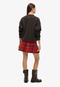 Superdry & Co CHECK - Jupe plissée - red black check