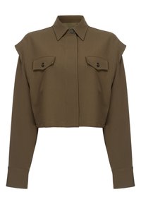 Giacca marrone aggiornata con colletto, due tasche sul petto e dettagli con bottoni. Realizzata in un tessuto testurizzato con cuciture visibili.