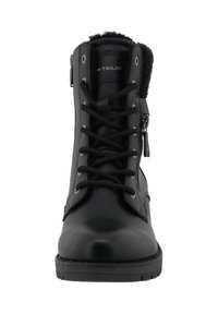 Bottines noires en cuir avec lacets, fermeture éclair sur le côté et doublure en fourrure, semelle robuste et col rembourré.