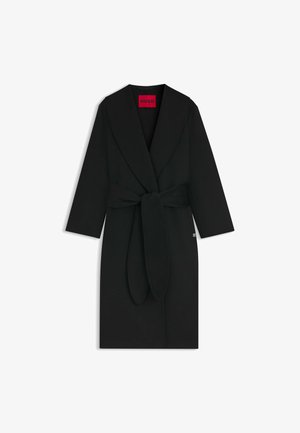 Zwarte wikkeljas van zachte stof met een brede kraag, lange mouwen en een gestrikt taille. Heeft een subtiele logodetail aan de zoom.