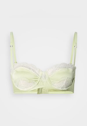 Jasnozielony biustonosz z koronkowymi akcentami, z fiszbinami, regulowanymi ramiączkami i teksturowanym wykończeniem. Posiada zapięcie na haftkę z tyłu.