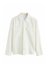 Cream-colored button-up shirt made from textured fabric, featuring a collared neck, two chest pockets, and long sleeves with button cuffs.