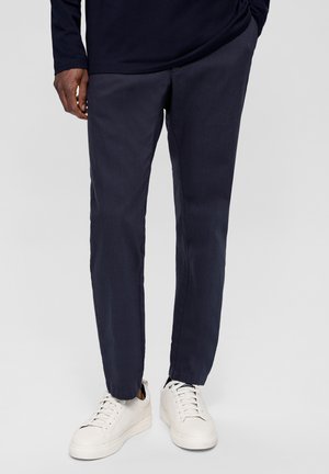 REGULAR MIT DOBBYSTRUKTUR - Chino - tiefblau