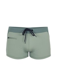 Shorts de bain verts en matière extensible, dotés d'une ceinture à cordon de serrage, d'une poche latérale et de détails de couture contrastants.