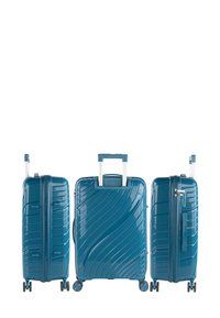 Maleta rígida color verde azulado con superficie con patrón de olas, mango telescópico y cuatro ruedas para movilidad. Cierres de cremallera y asa lateral.