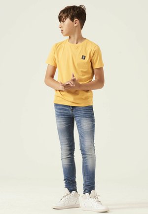 XANDRO - Slim fit jeans - vintage used