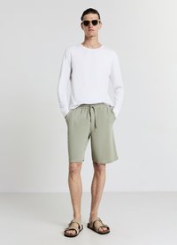 Calliope GINNICO - Pantaloni sportivi - salvia