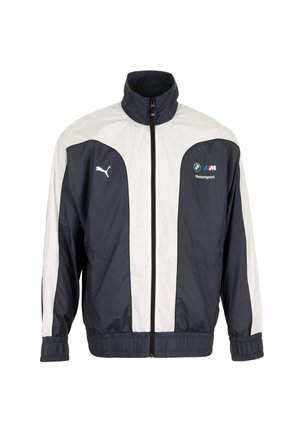 Veste zippée Puma bleu marine et blanc avec logos BMW Motorsport, poignets élastiques et col montant.