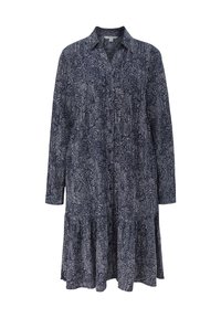 Mörkblå skjortklänning med långa ärmar, knappstängning fram och tierad nederkant. Har ett vitt abstrakt mönster och klassisk krage.