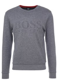 Sweat-shirt gris à manches longues avec col rond, logo "BOSS" subtilement embossé, poignets et ourlet côtelés.