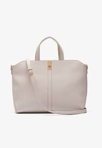 Light beige tote bag made of smooth synthetic material, featuring dual handles, a detachable shoulder strap, and a gold accent on the front.