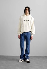 Filippa K Bootcut-farkut - washed mid blue