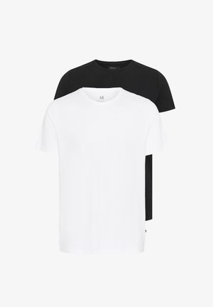 Dos camisetas de cuello redondo en negro y blanco, hechas de algodón. Tienen mangas cortas, un ajuste relajado y un diseño liso sin estampados.