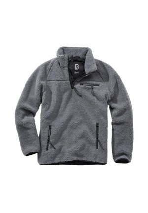 Harmaa fleeceneule puolivetoketjulla, korkealla kauluksella, rintataskulla vetoketjulla ja kahdella vetoketjullisella käsitaskulla, valmistettu paksusta teksturoidusta kankaasta.