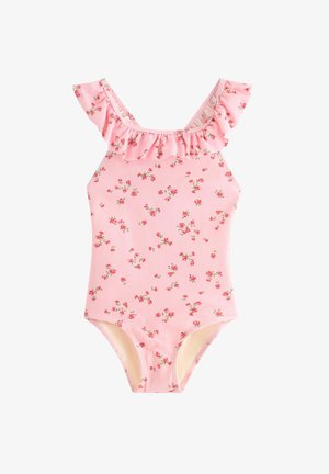 Pink badedragt med små røde blomsterprint og flæsekantede stropper omkring halsudskæringen, designet til et barn.