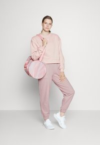 Puma LOUNGEWEAR SUIT  - Tuta - rose quartz