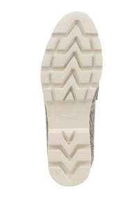 Vionic schoenzool, rubber materiaal, gestructureerde witte onderkant, zigzag loop patroon voor grip, met merknaam geïmplanteerd nabij de hiel.