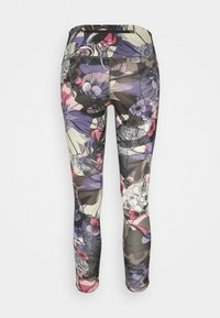 Blomstertrykte leggings med pastelfarver som pink, lilla og grøn. Det strækbare stof har en mat finish og en tætsiddende ankel-design.