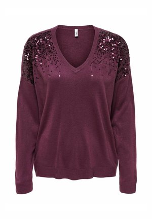 Pull en V profond violet avec des manches longues. Avec des sequins noirs sur les épaules pour accent. Texture douce avec un ourlet et des poignets côtelés.