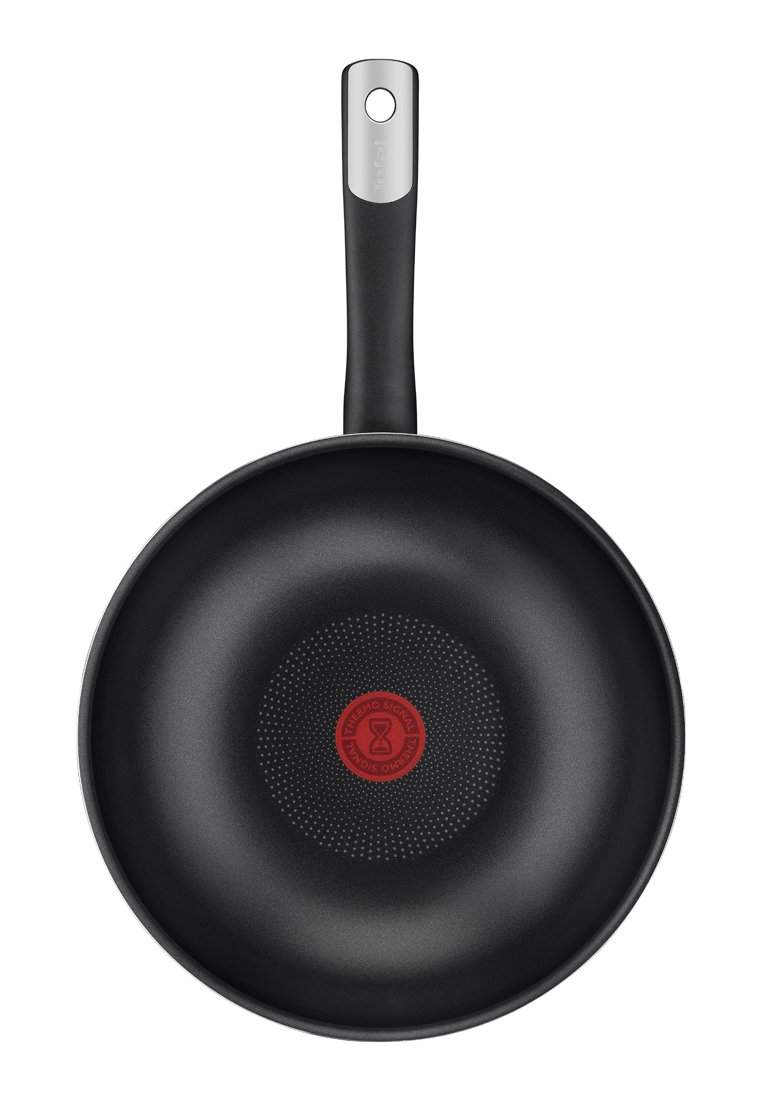 Zwarte antiaanbak koekenpan met een thermo-spot indicator in het rood in het midden, ergonomische zwarte handgreep en een gladde, cirkelvormige vorm.