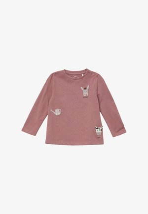 Roze blouse met lange mouwen, gemaakt van zachte stof, met geborduurde dierontwerpen: een ezel, een koe en een gieter.