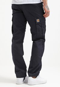Carhartt WIP PANT COLUMBIA  - Hlačami s stranskimi žepi - dark navy rinsed