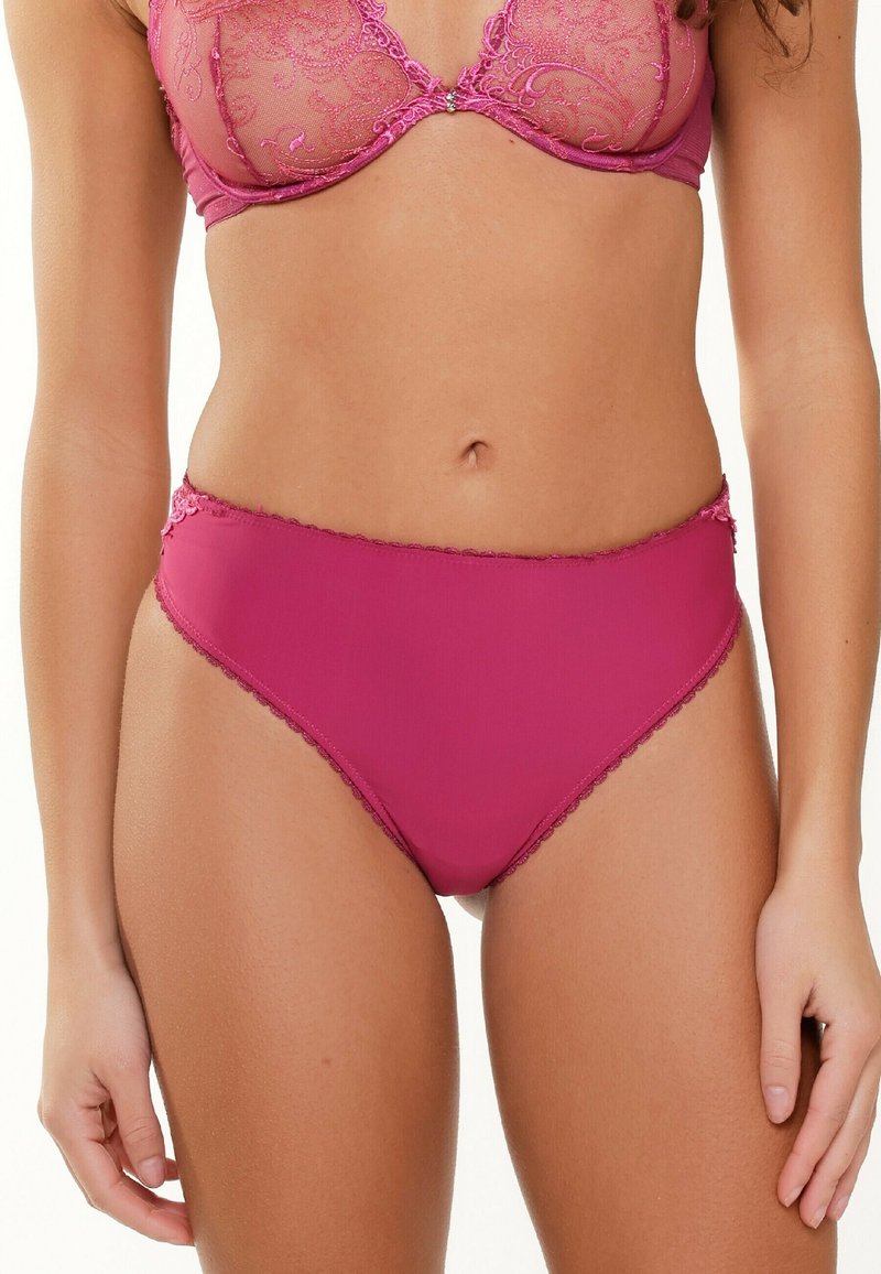 Pink lingerie set featuring a sheer lace bra with intricate patterns and a matching high-waisted panty with scalloped edges.