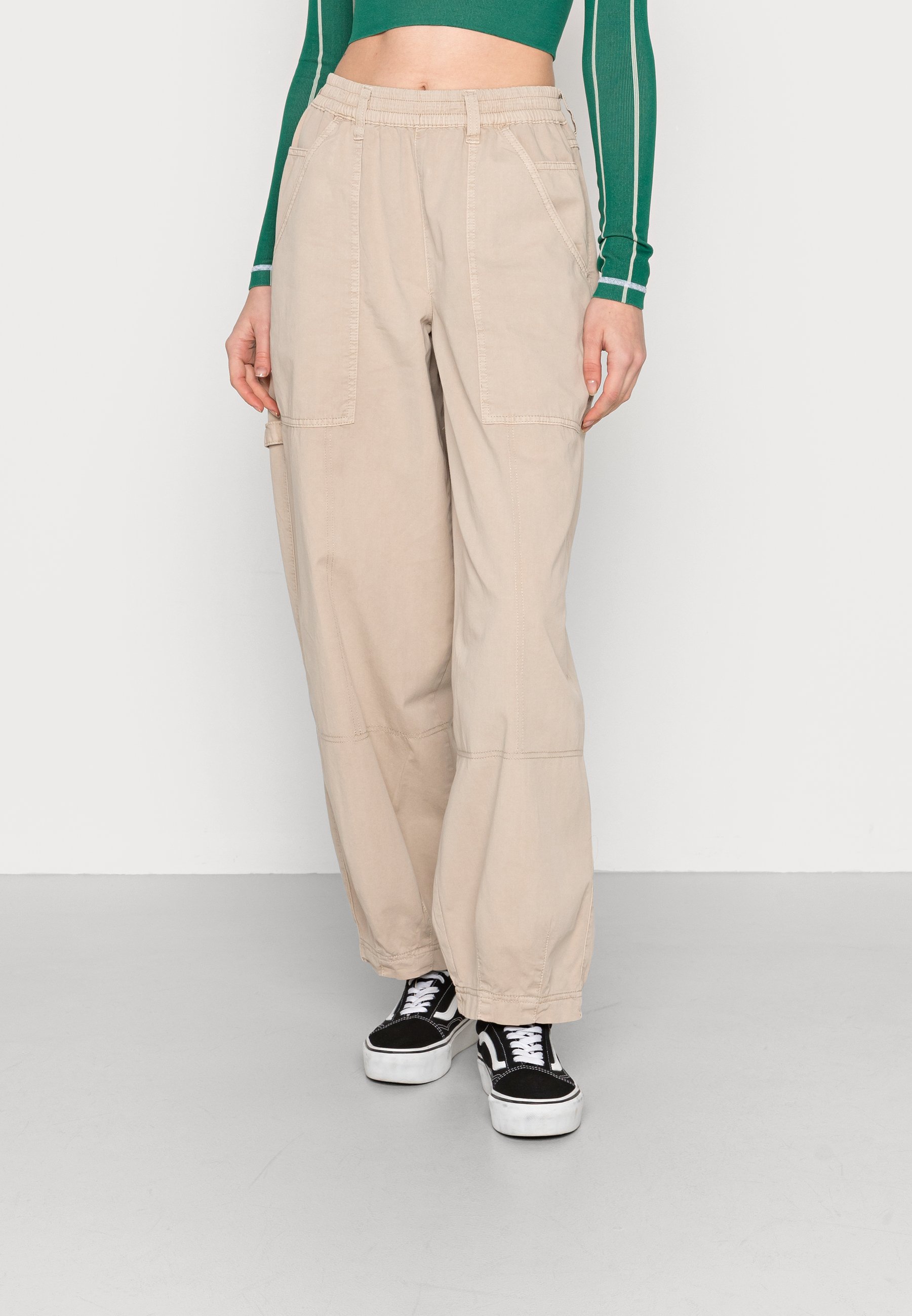 beige baggy trousers