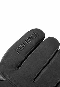 Schwarze Handschuhe aus weichem, strukturiertem Stoff mit verstärkten Nähten und geprägtem Markenlogo "reusch" auf der Oberseite.