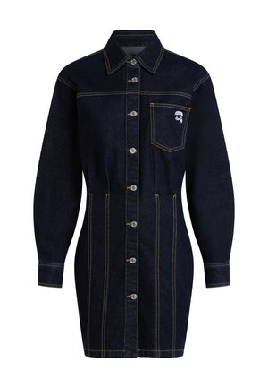 Dark denim shirt dress with a collared neck, buttons down the front, and long sleeves. Features a chest pocket and yellow stitching accents.