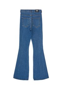 Flared blue denim jeans with a mid-rise waist, five-pocket design, and a subtle texture. Features a branded back patch and stitched seams.