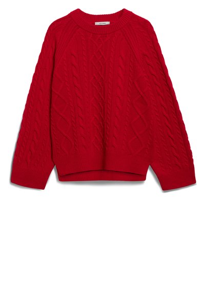 Raudonas megztinis su pynių raštu, su raukinėta apykakle ir rankogaliais, bei laisvu siluetu. Su trumpu kraštu ir raglano rankovėmis.