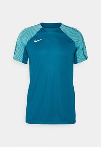 Blå Nike sporttröja med ljusblå mönstrade kortärmar och en vit Nike swoosh på bröstet.