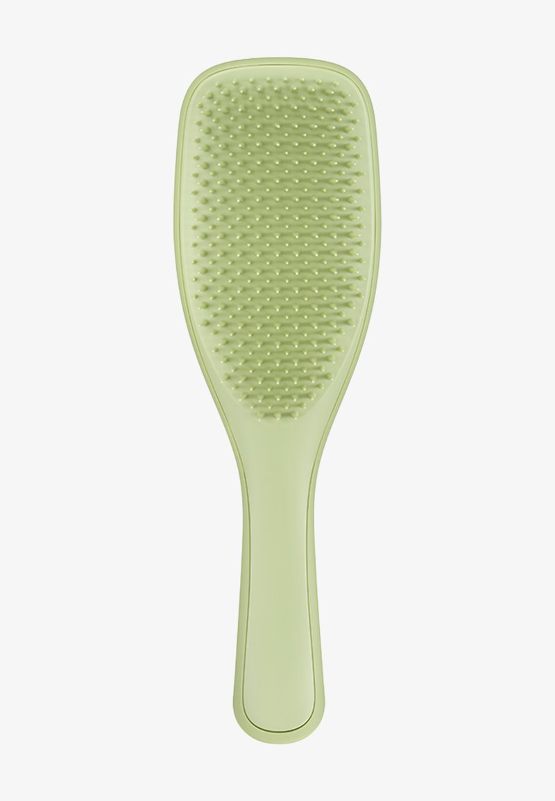 Szczotka do włosów w stylu paddle z teksturowaną, jasnozieloną plastikową główką i uchwytem. Włosie to wypukłe kropki, które skutecznie rozplątują włosy.