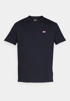 Black t-shirt made of cotton, featuring short sleeves and a crew neck. Small logo in red, white, and blue on the left chest area.