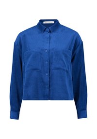 Niebieska koszula z kołnierzykiem, zapinana na guziki, wykonana z kordurowej tkaniny. Posiada dwie kieszenie na piersi oraz długie rękawy. Ribbed texture i luźny krój.